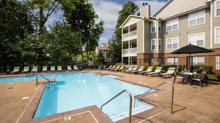 Resort-Inspired Pool with Sundeck and Lounge Seating